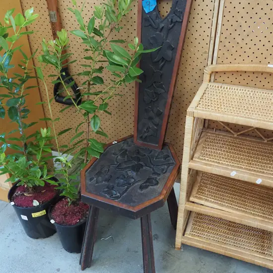 heavily chip carved high back spinning wheel chair