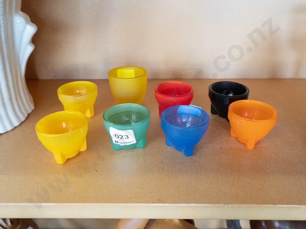 assorted coloured glass egg cups Image 1++