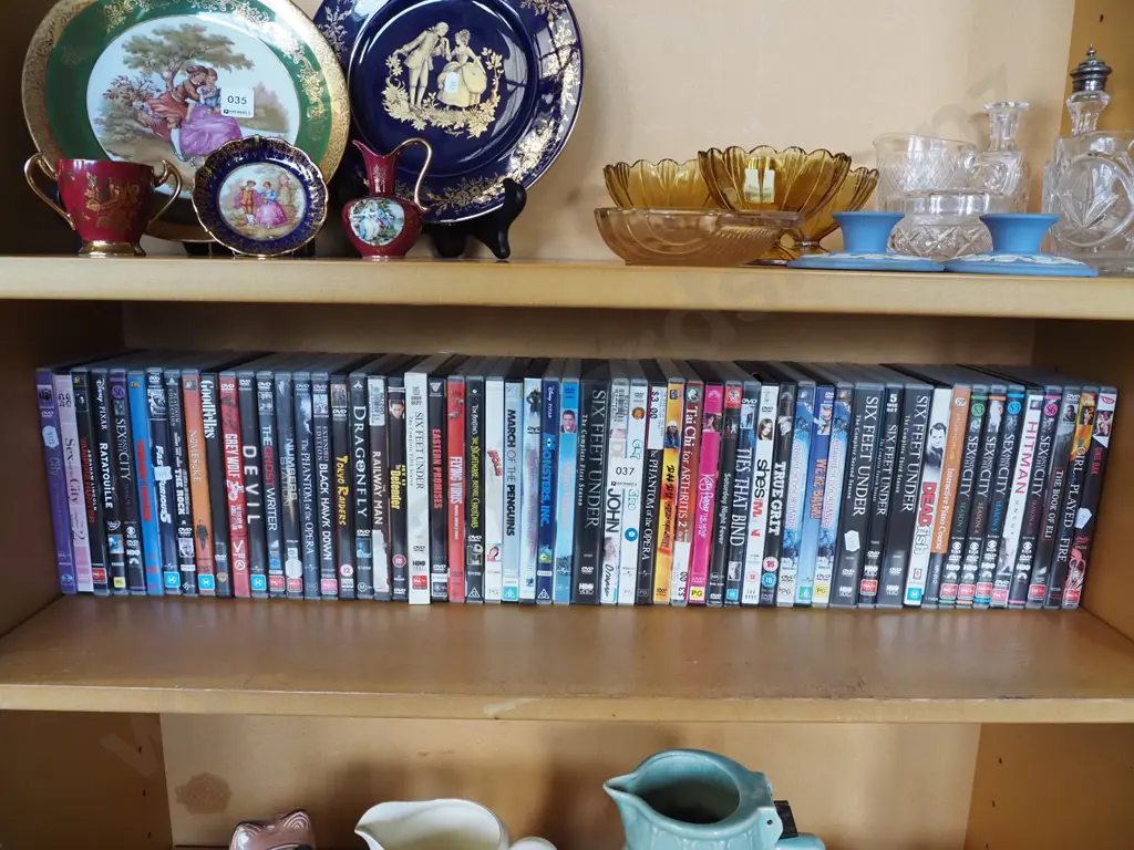 shelf of DVDs Image 1++