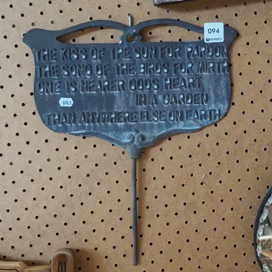 cast metal garden motto