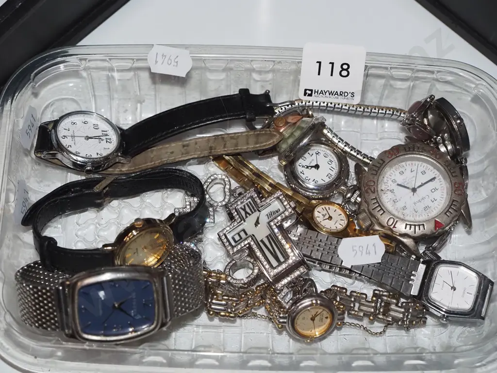 plastic tray of wristwatches Image 1++