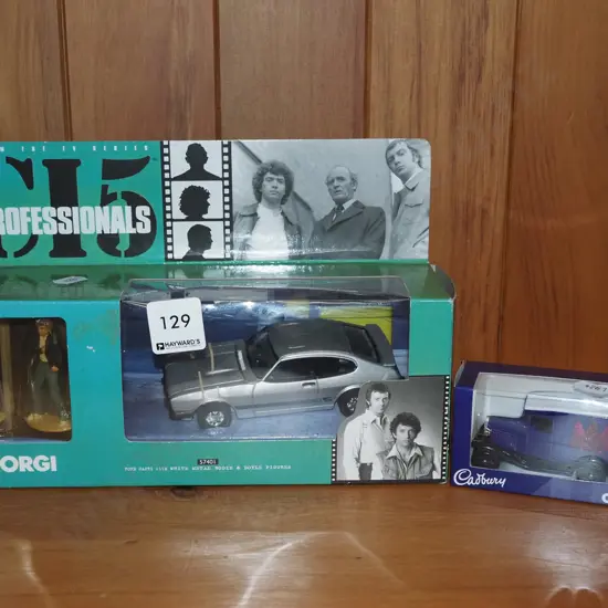 Professionals boxed diecast car and figurines, Corgi Cadbury van