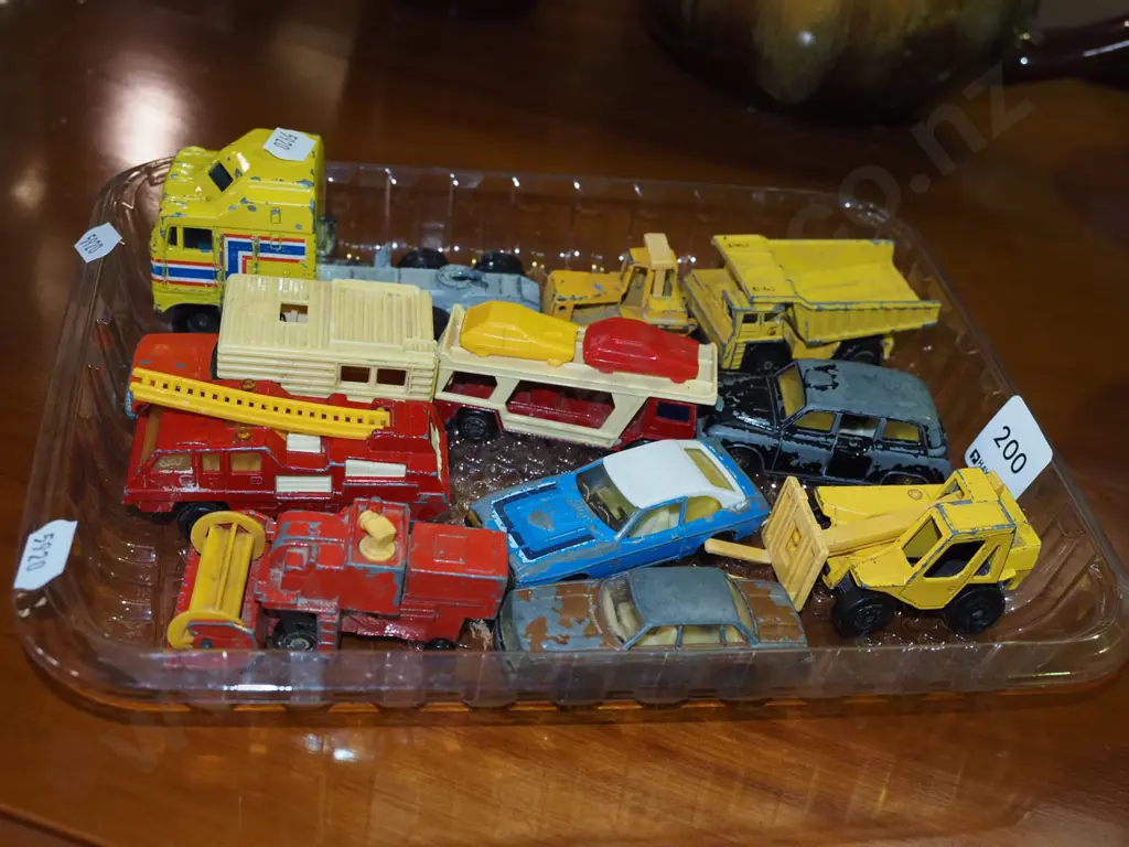 plastic tray of toy vehicles Image 1++