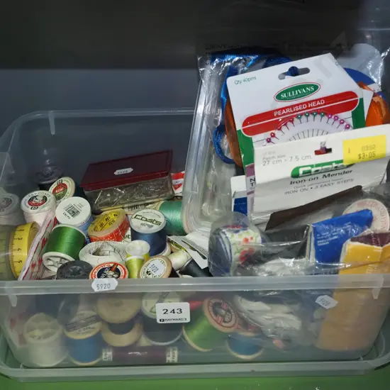 tub of sewing threads; pins, tapes
