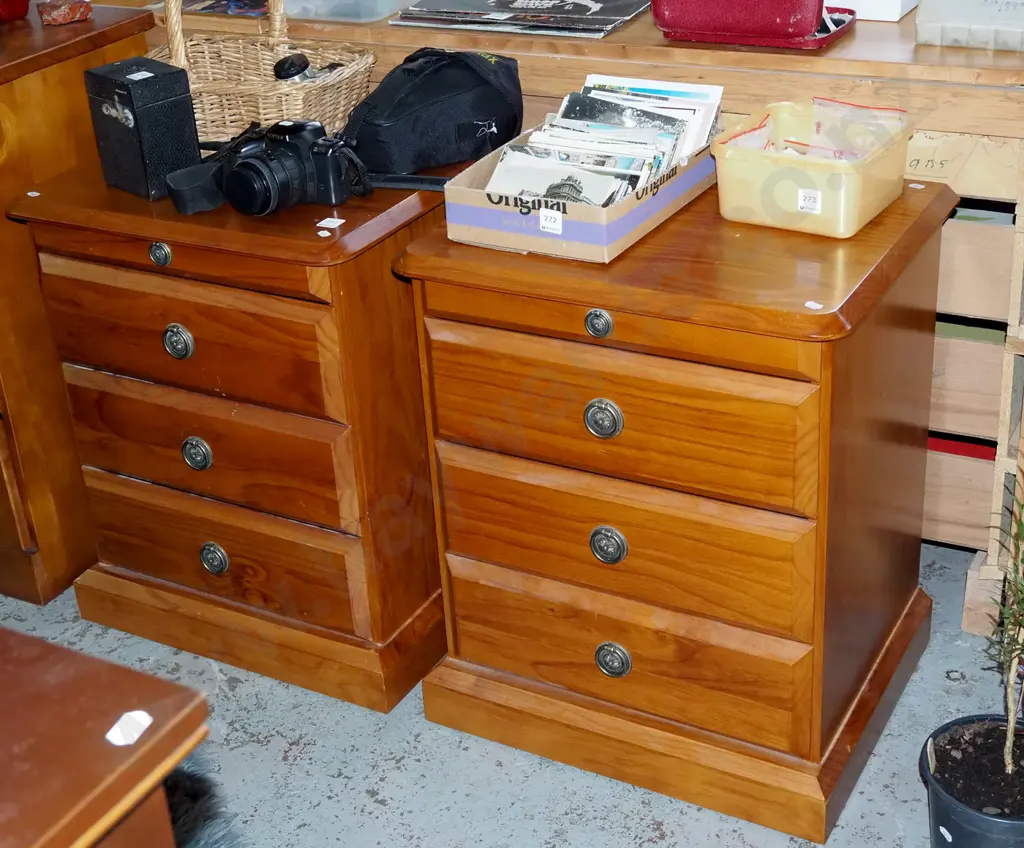 pair of pine 3 drawer matching bedside cabinets with drop handles and pull out trays Image 1++