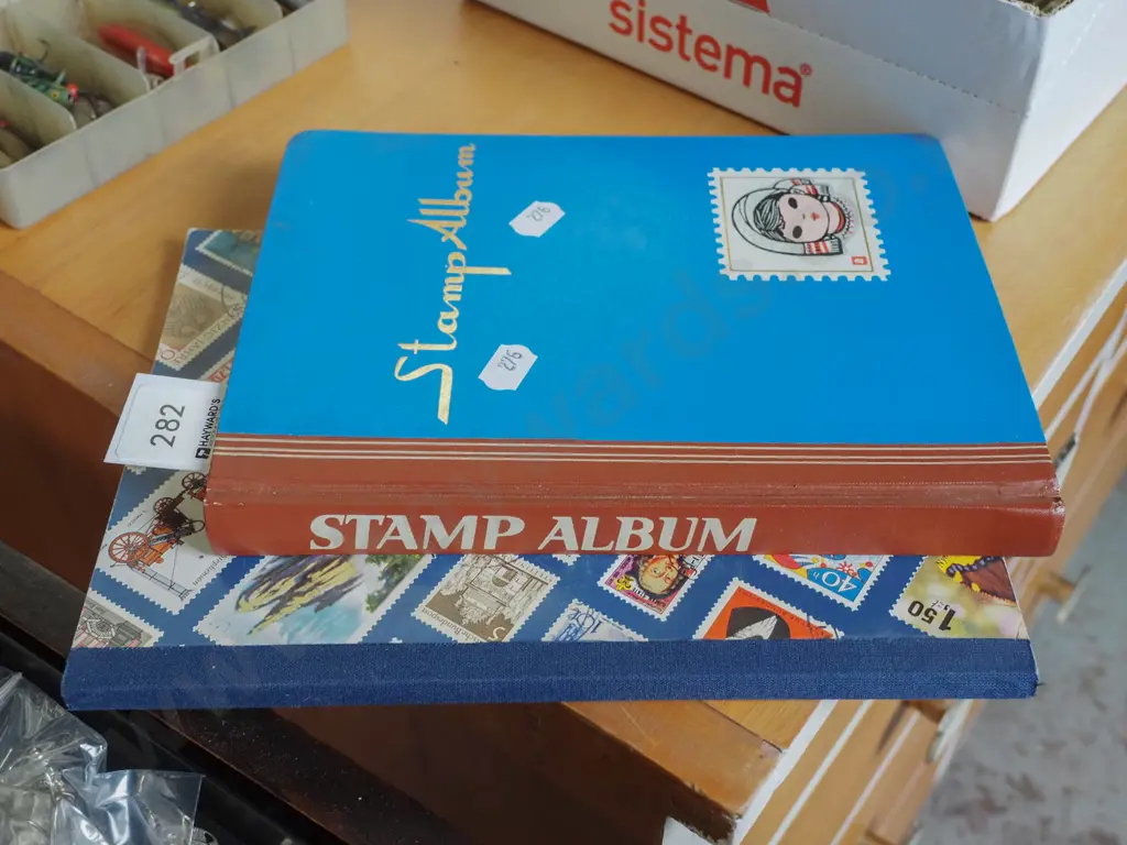 2x stamp albums Image 1++