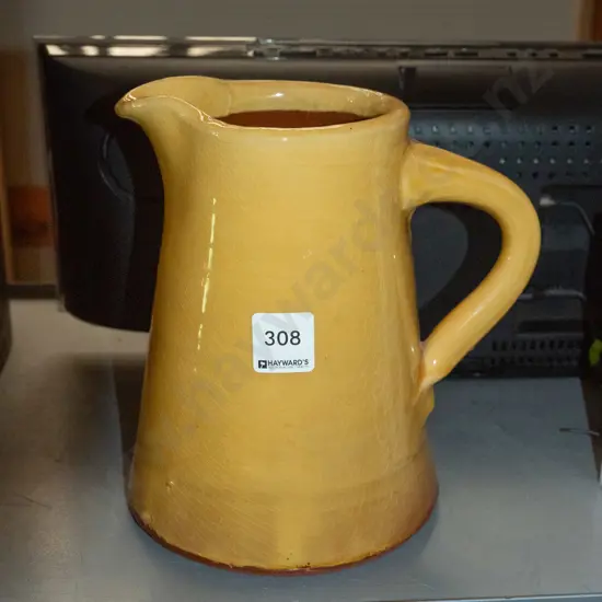 terracotta yellow glazed water jug