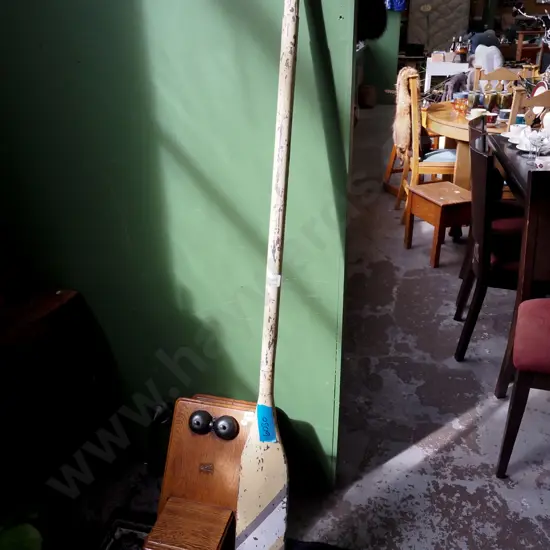 painted wooden short oar