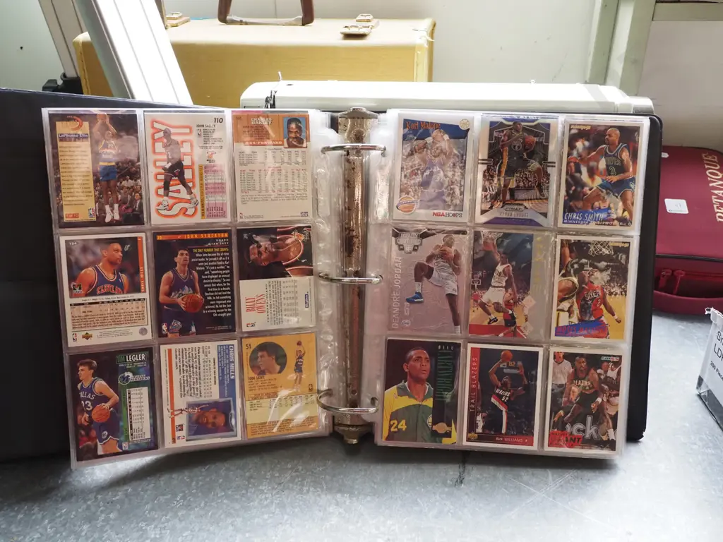 album of basketball collector cards Image 1++