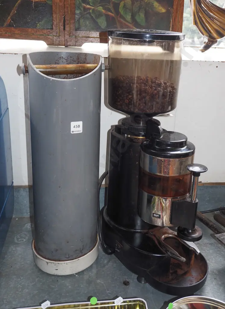 unbranded commercial coffee grinder with beans and a tap out Image 1++