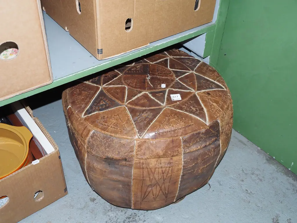 worn leather pouffe Image 1++