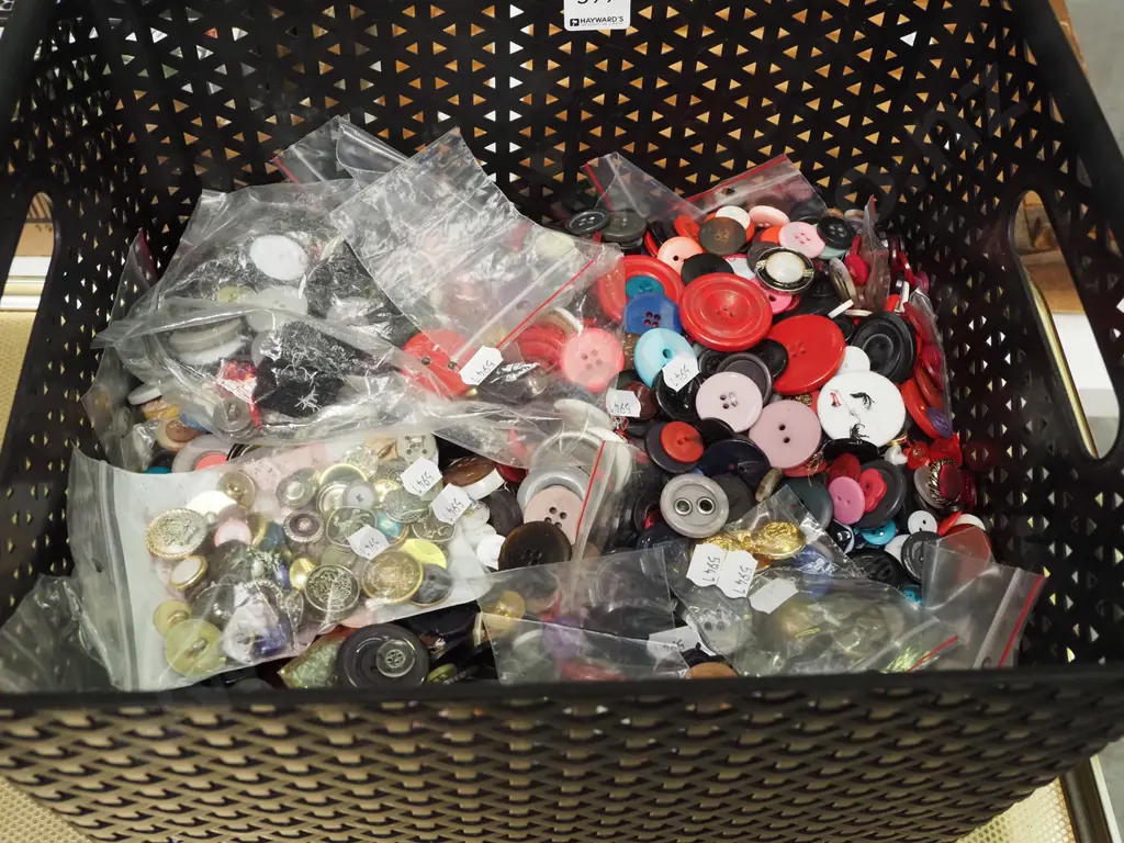 large plastic tub of numerous buttons Image 1++