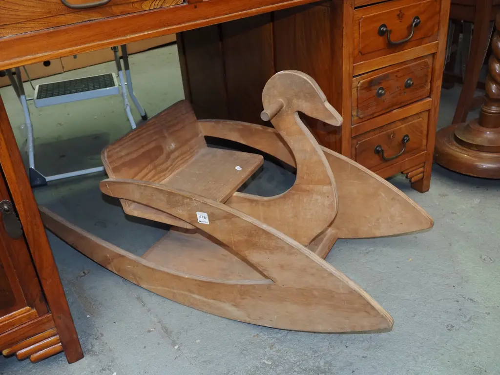 child's riding on rocking swan Image 1++