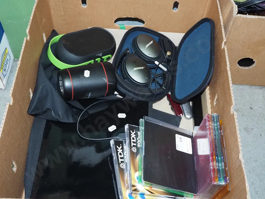 box; blue tooth speaker, Bose headphones, pocket knives etc Image 1++
