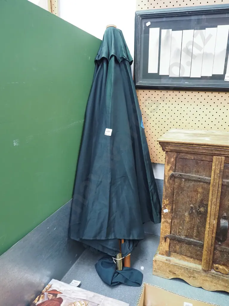 small green fabric sun umbrella Image 1++