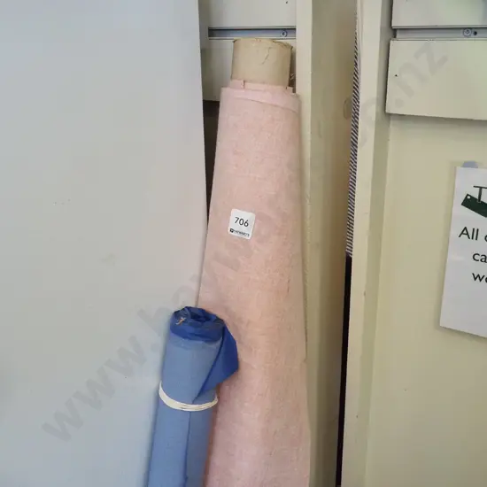 bolt of red vinyl, blue fabric