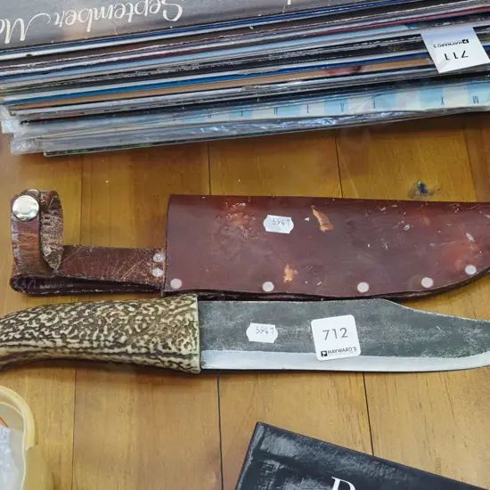 hunter's knife and leather sheaf