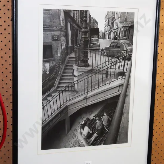 framed photo print - boys looking through grate