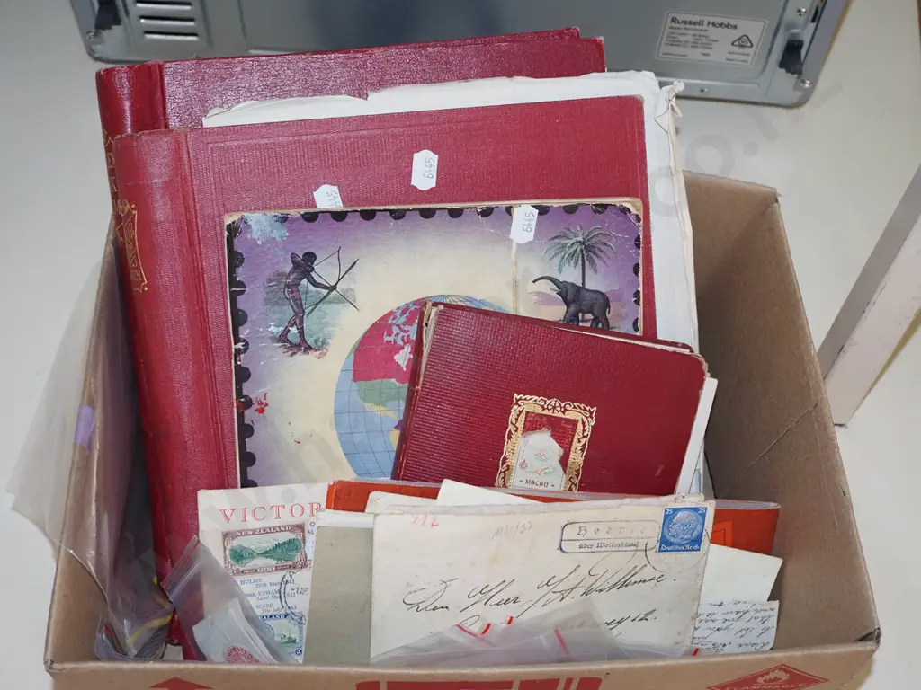 box of stamp albums and stamps Image 1++