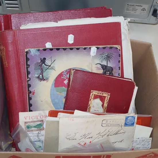 box of stamp albums and stamps