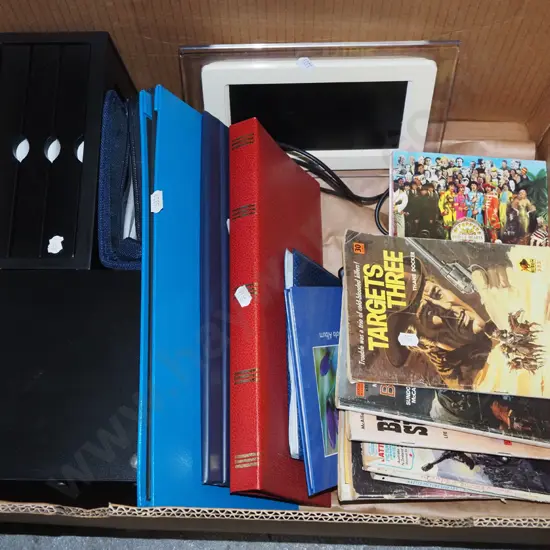 box; cowboy graphic novels, photo albums, digital photo frame etc