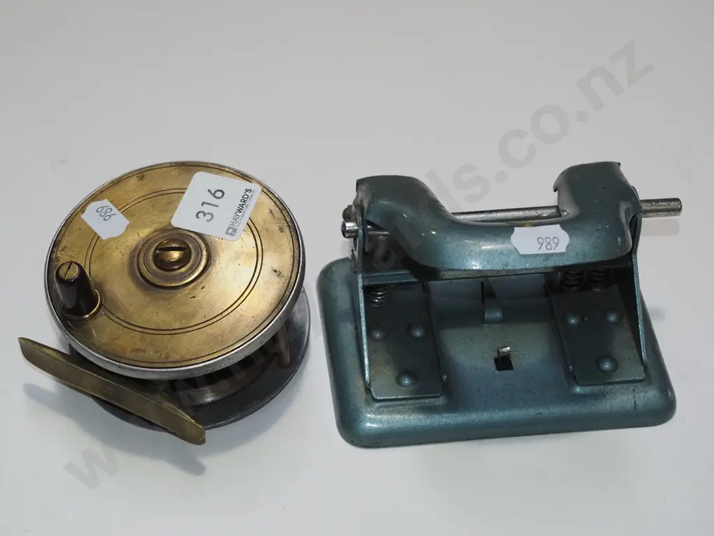 fly fishing reel & hole punch Image 1++