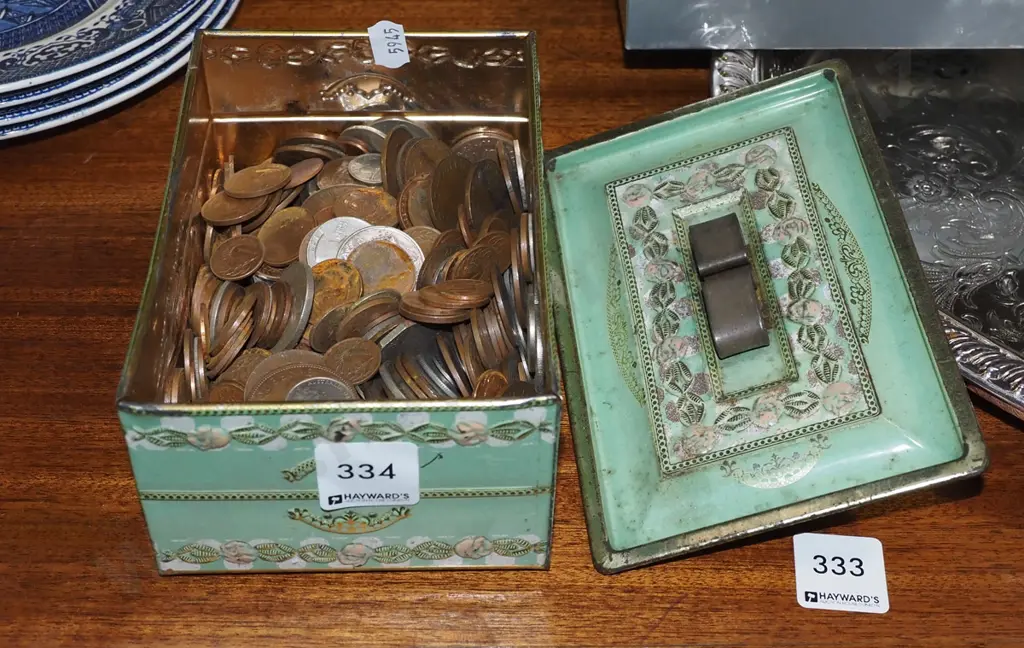 tin of coins Image 1++