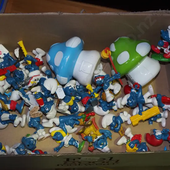 box of Smurfs and mushroom houses