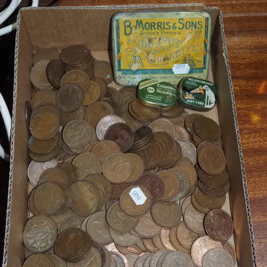 box of coins and tins