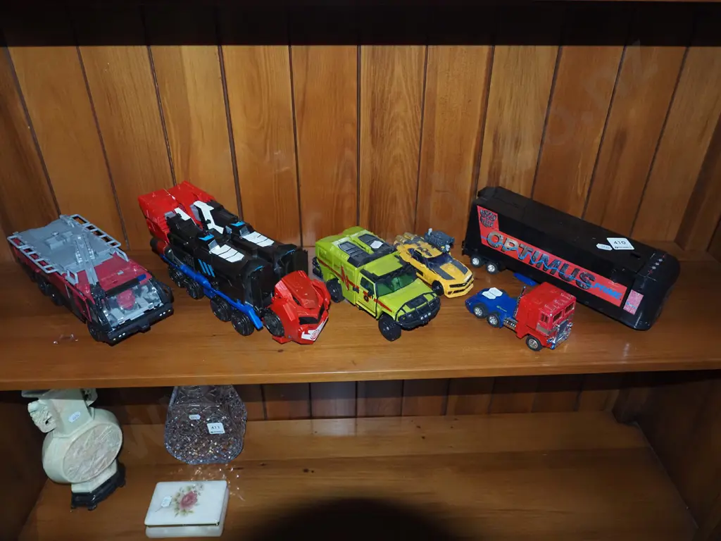 shelf of model vehicles Image 1++