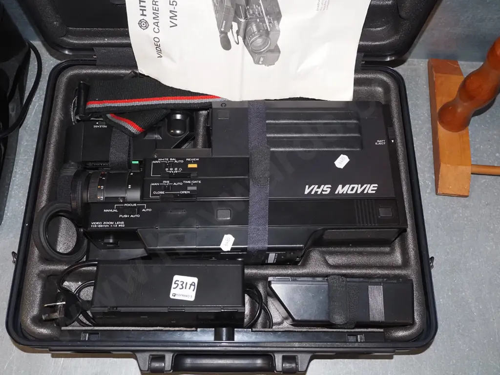 cased Hitachi VHS camcorder Image 1++