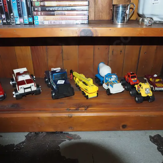 shelf of toy vehicles