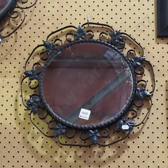 wrought metal circular wall mirror