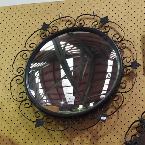 wrought metal circular wall mirror