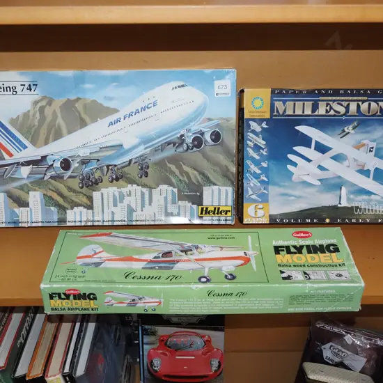 3x yet to be assembled model planes