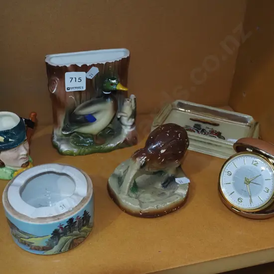 shelf; travel alarm clock, toby jug, vase etc