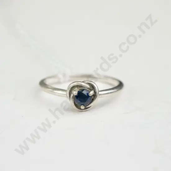 Silver ring with blue stone