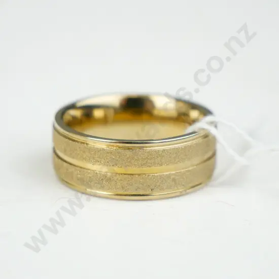 Gold coloured decorative ring