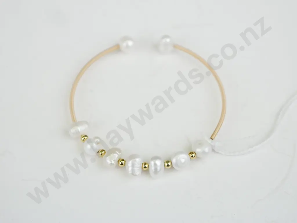 Gold open close bracelet with pearl beads and gold beads Image 1++