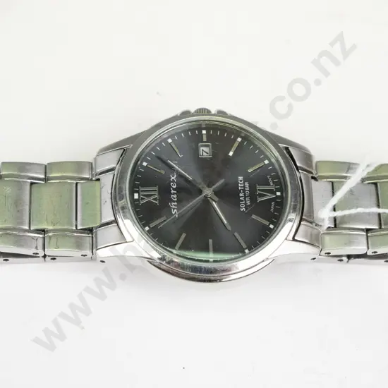 Silver dress watch, branded SHAREX 1