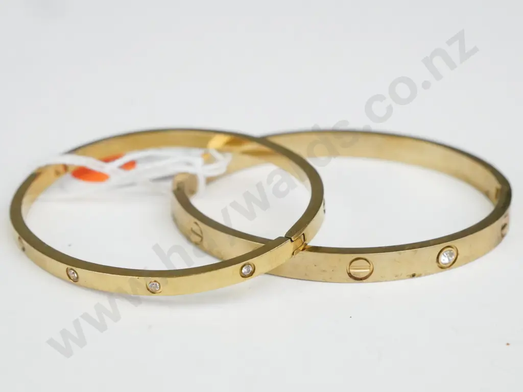 2x Gold Coloured bracelet with silver gems Image 1++