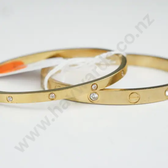 2x Gold Coloured bracelet with silver gems
