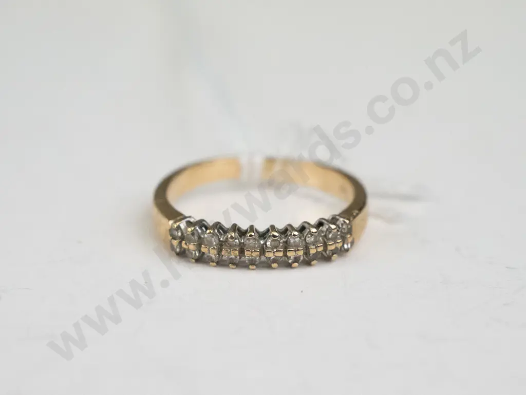 Small gold ring with 10 diamond like gems Image 1++