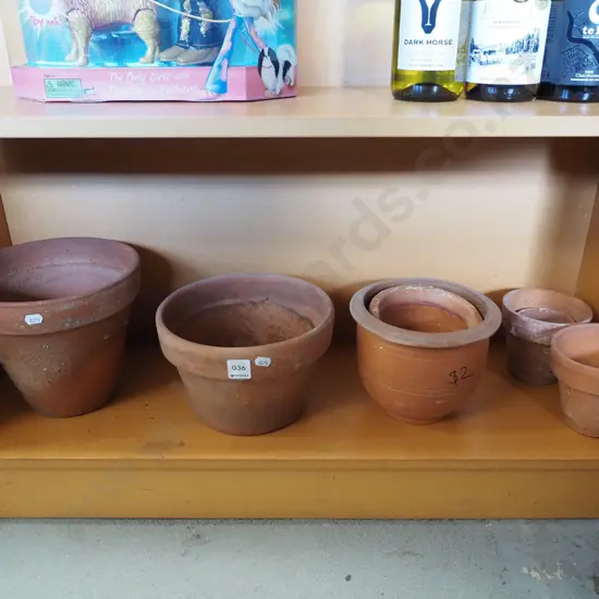 shelf; terracotta planters