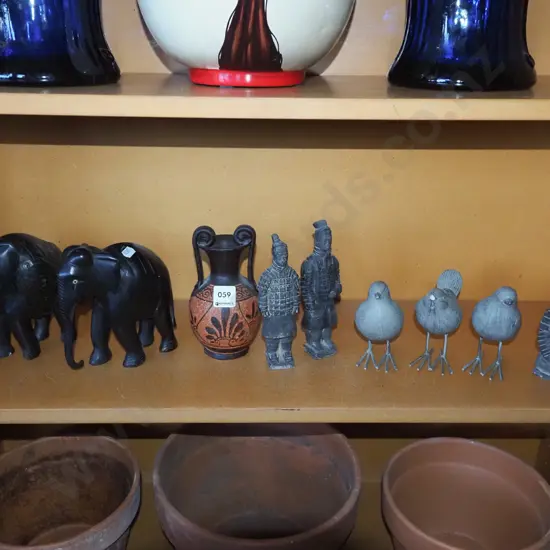 shelf; elephant figurines, warrior figurines etc - damage to bird figurine beaks