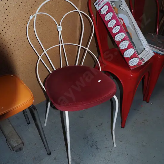 wrought metal and velvet upholstered stool