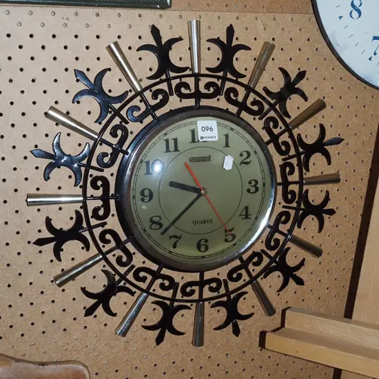 wrought metal wall clock
