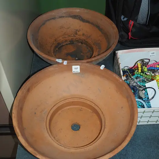 2x shallow terracotta planters Largest Diam370