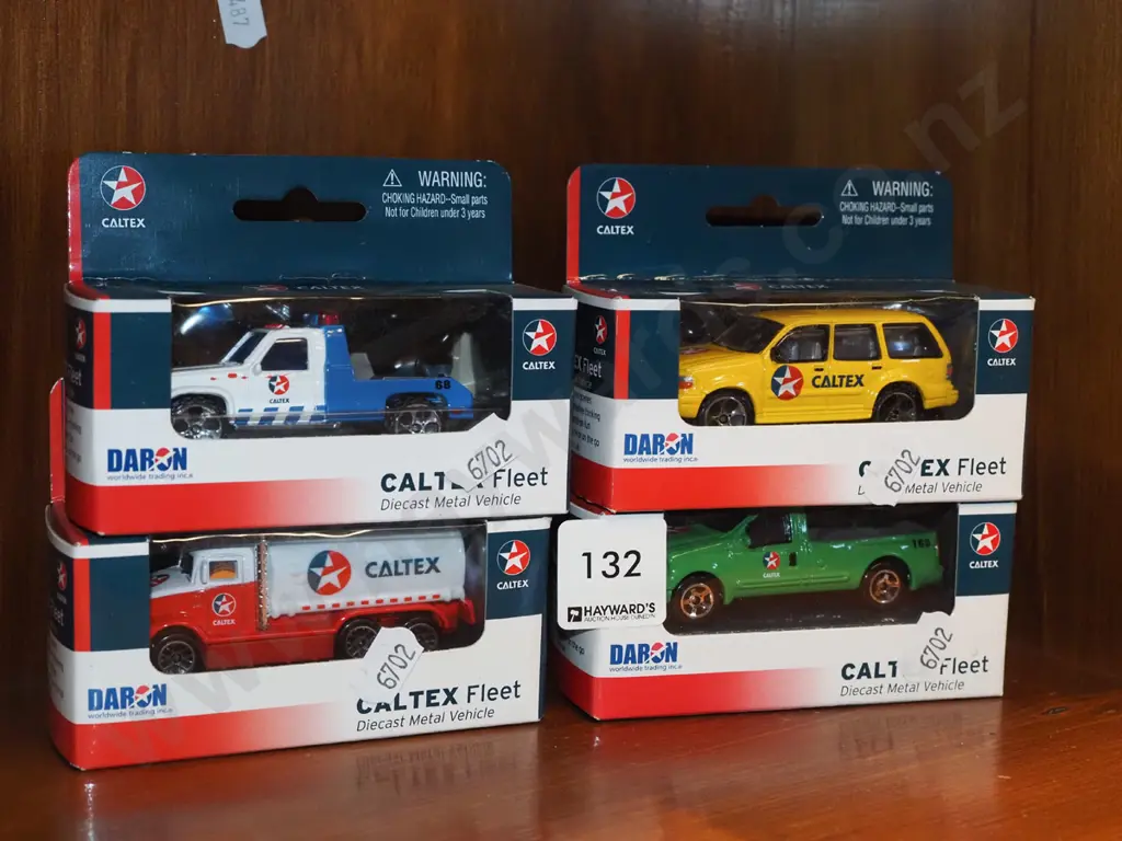 4x boxed as new Caltex diecast models Image 1++