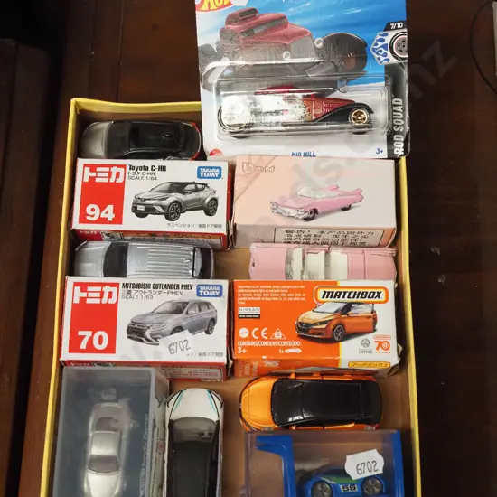 tray of toy vehicles